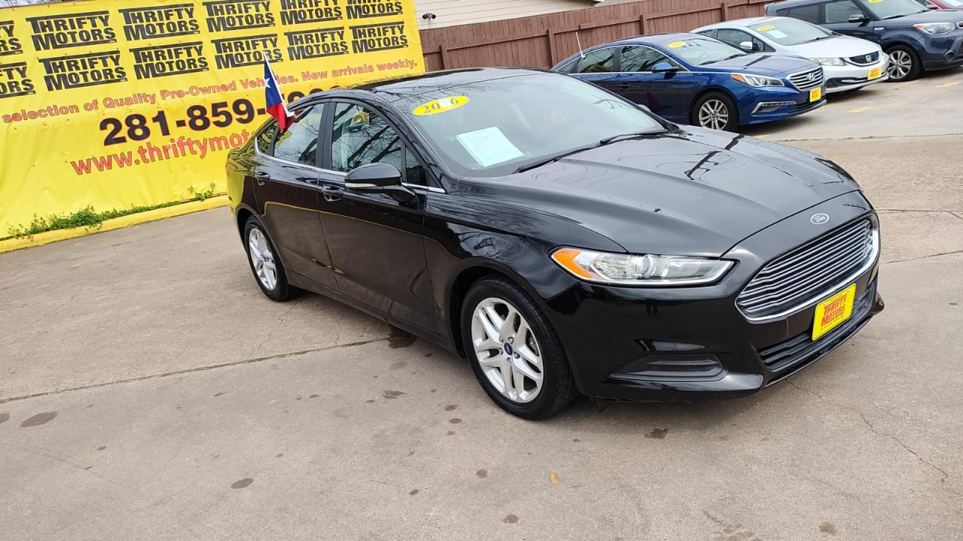 2016 Ford Fusion SE (3FA6P0HD8GR) with an 1.5L L4 DOHC 16V engine, 6-Speed Automatic transmission, located at 16710 Clay Rd., Houston, TX, 77084, (281) 859-7900, 29.834864, -95.656166 - Photo#3